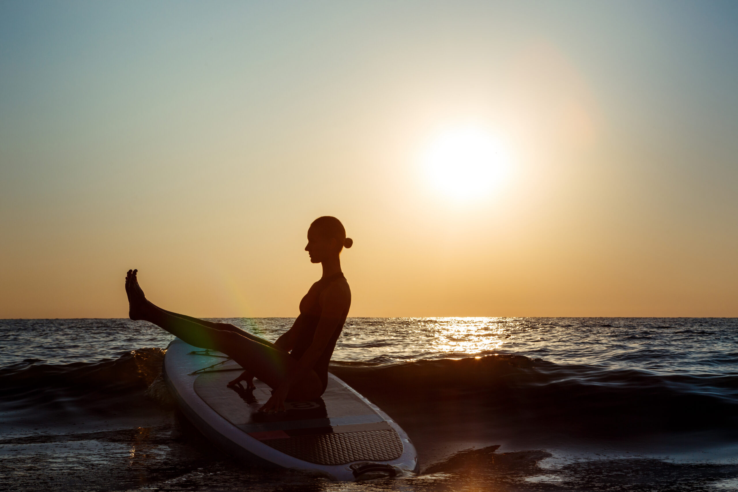 Ejercicios y estiramientos paddle surf - posicion del barco